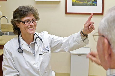 Dr. Lisa Gibbs with patient